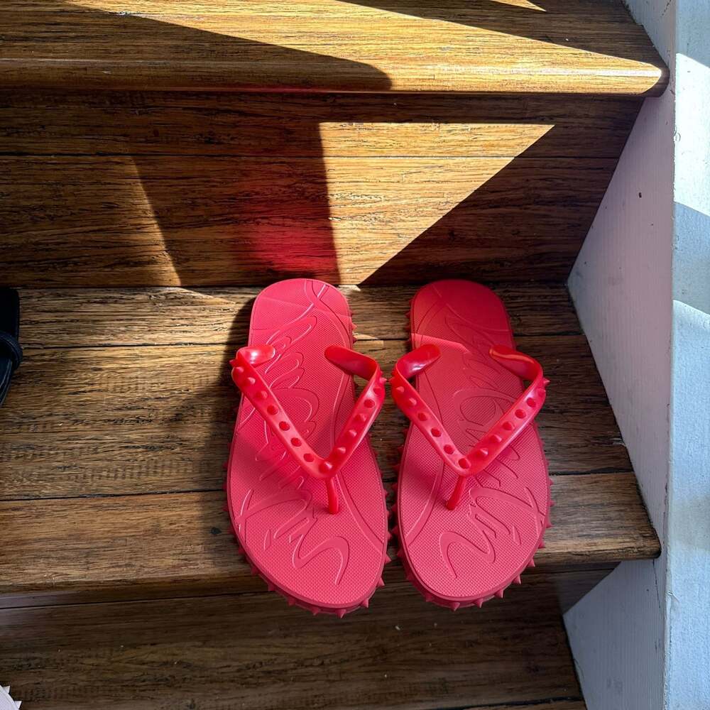 Super Loubi Studded Rubber Flip Flops in Orange